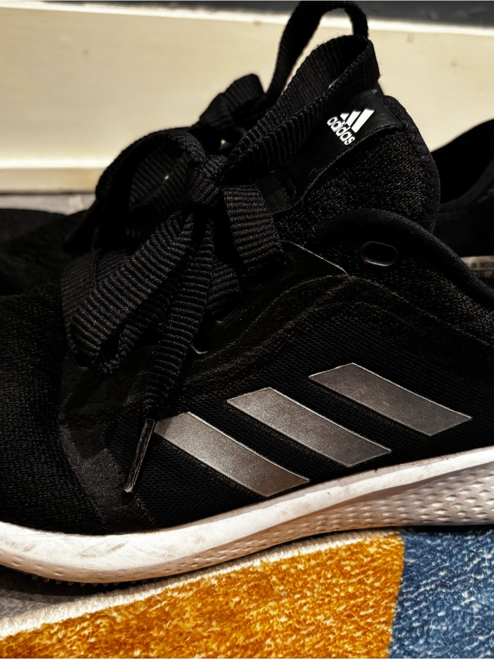 adidas Black Sneakers with Silver Three-Stripes